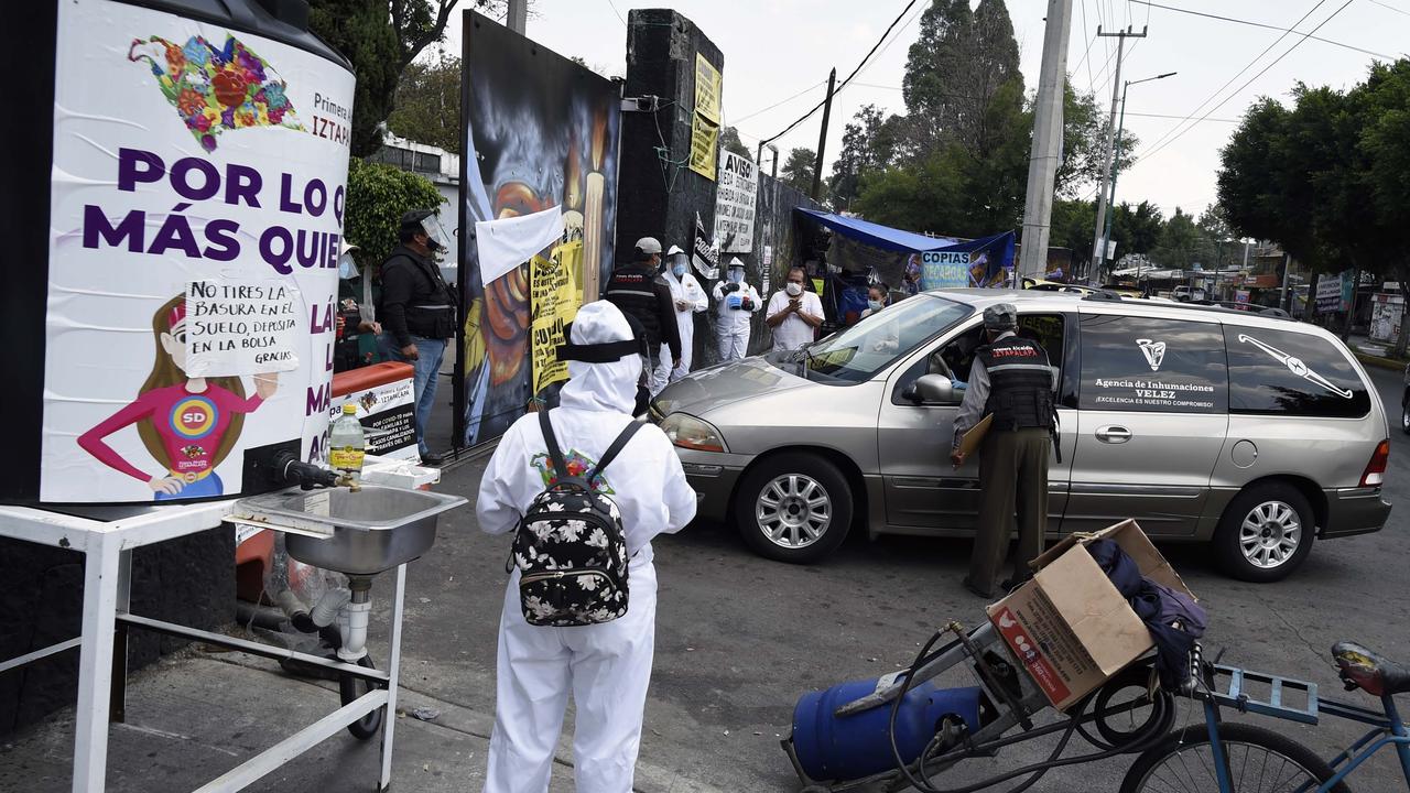 A hearse arrives at the San Nicolas Tolentino Civil Pantheon in Mexico City on Tuesday. Picture: Alfredo Estrella/AFP