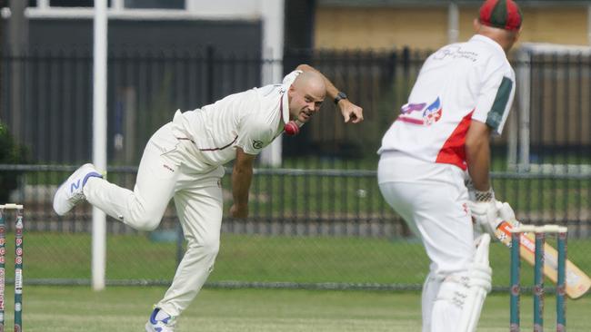 Red Hill captain Glenn Collett goes at Nick Christides. Picture: Valeriu Campan