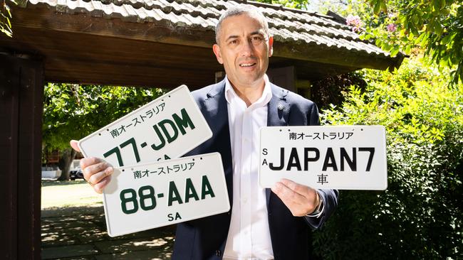 Tom Koutsantonis at the Adelaide Himeji Garden with new, limited-edition Japanese-style number plates. Picture: Morgan Sette.