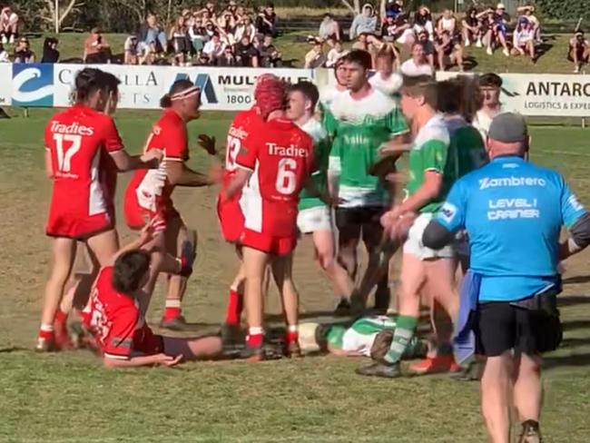 Players converge after the tackle.