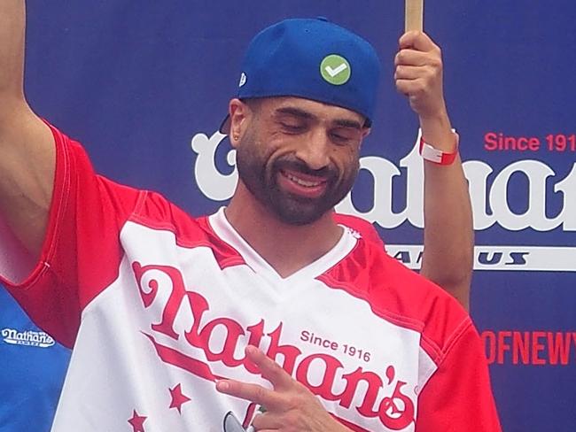 NEW YORK, NY - JULY 04:  James Webb (R) competes in the 2023 Nathan's Famous International Hot Dog Eating Contest at Coney Island on July 4, 2023 in New York City.  (Photo by Bobby Bank/Getty Images)