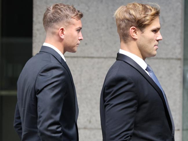 Callan Sinclair and Jack de Belin leaving Downing centre courts during the second trial. Picture: NCA NewsWire / Damian Shaw