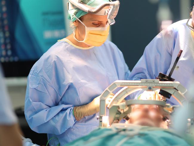 Sarah Olson, brain surgeon in the operating theatre. Pic Peter Wallis