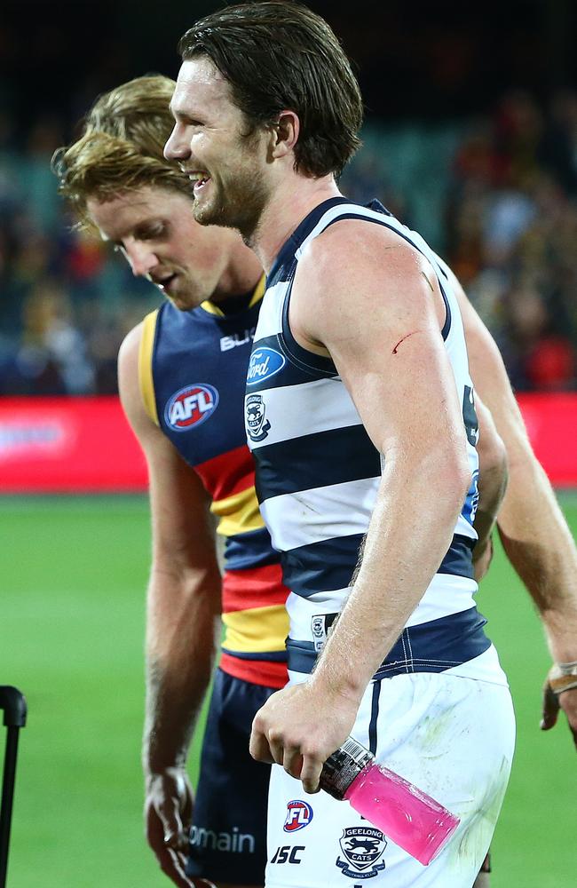 Geelong’s Patrick Dangerfield with Adelaide’s Rory Sloane. Picture: SARAH REED