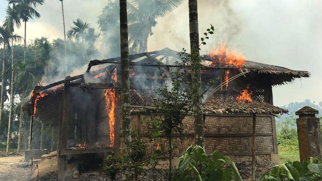 A Rohingya village burns in Rakhine state, Myanmar.