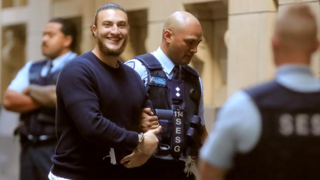 Ahmed Mohamed grins as he arrives at court. Picture: Stuart McEvoy