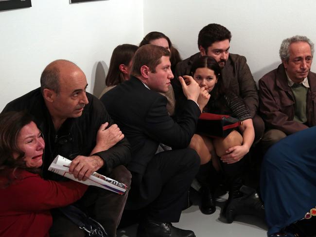 Spot News - First Prize, Stories Picture: Burhan Ozbilici, The Associated Press Title: An Assassination in Turkey Mevlüt Mert Altıntaş, a 22-year-old off-duty police officer, assassinated the Russian ambassador to Turkey, Andrey Karlov, at an art exhibition in Ankara, Turkey, on 19 December 2016. He wounded three other people before being killed by officers in a shootout. Gallery goers cower after the shooting.