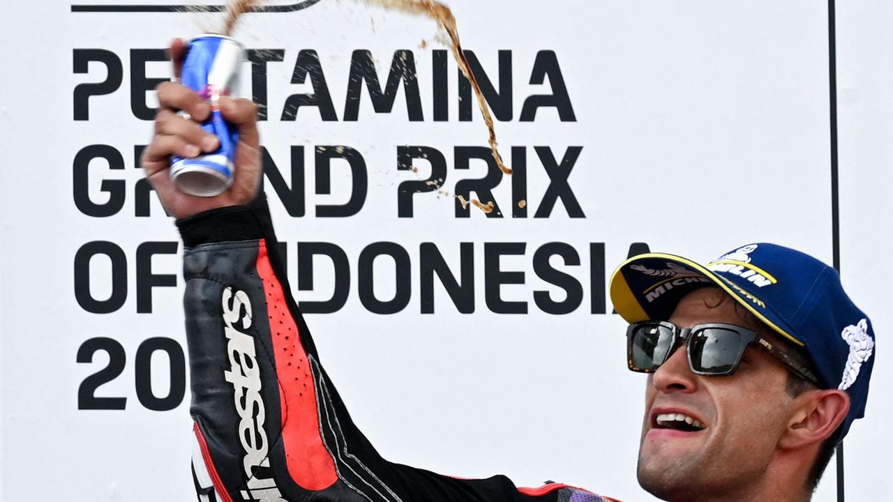 First-placed Prima Pramac Racing's Spanish rider Jorge Martin celebrates on the podium following the MotoGP race of the Indonesian Grand Prix at the Mandalika International Circuit in Mandalika, West Nusa Tenggara on September 29, 2024. (Photo by SONNY TUMBELAKA / AFP)