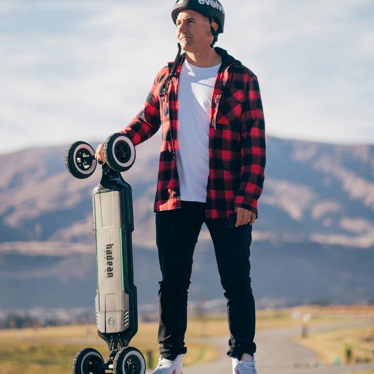 Evolve Skateboards’ co-founder Jeff Anning and a carbon e-Skateboard. Picture: Supplied