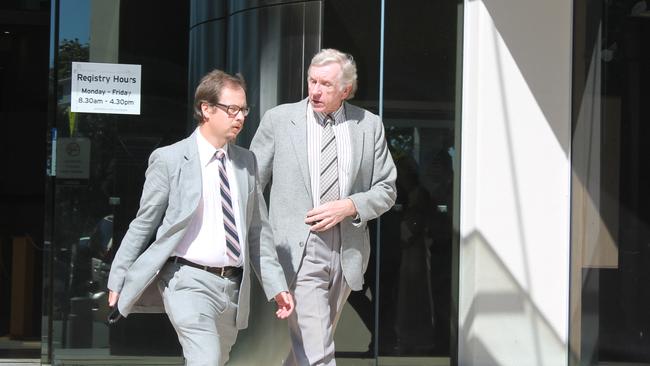 Vincent Berg (right) leaves the Southport Magistrates Court. Picture: Meagan Weymes.