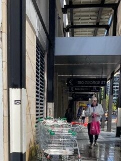 The Woolworths Metro supermarket has not opened at George St yet but carts are still dumped there.