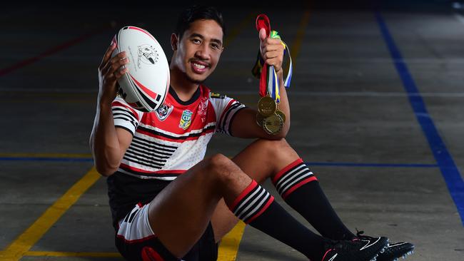 Kirwan High's Julian Christian with his swag of medals. Picture: Evan Morgan