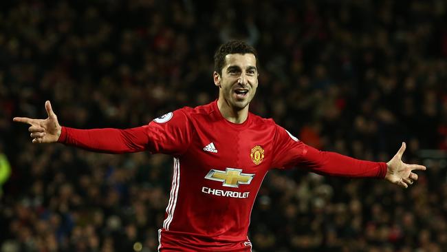 Henrikh Mkhitaryan of Manchester United celebrates after scoring a goal.