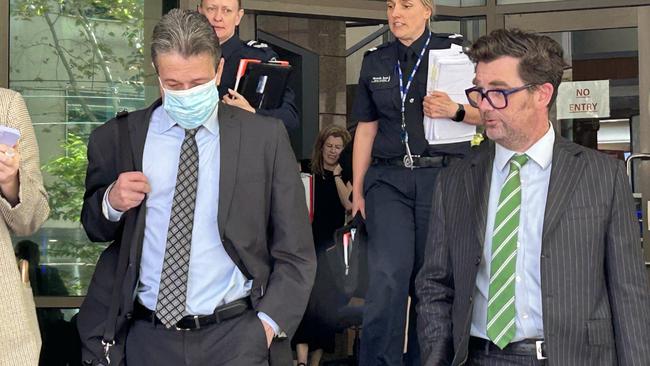 Chiropractor Ian Deitch, with mask on, has been committed to trial in County Court on rape and sexual assault charges.