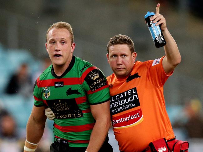 South Sydney’s Jason Clarke goes off with concussion. Picture Gregg Porteous