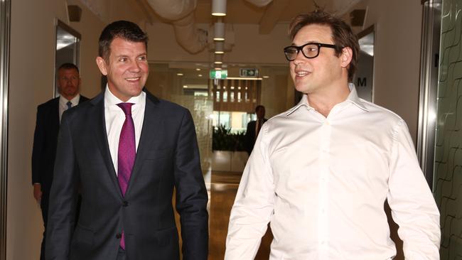 The-then NSW Premier Mike Baird (left) opens Uber's Australian home in Sydney in 2016 with the-then general manager David Rohrsheim, Picture Chris Pavlich