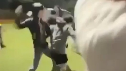 A suspect captured throwing a punch at the teen. Picture: 2GB