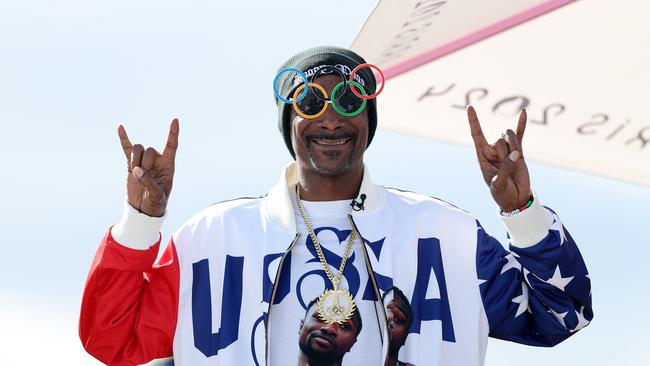 Snoop Dogg, a cultural icon, continues to influence music, business, and philanthropy. He served as a special correspondent for NBC at the 2024 Paris Olympics, where he carried the Olympic torch, cheered on Team USA, and performed at the closing ceremony. Picture: Getty