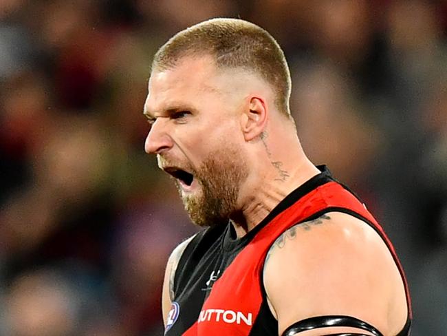 MELBOURNE, AUSTRALIA - JUNE 29: Jake Stringer of the Bombers celebrates kicking a goal during the round 16 AFL match between Geelong Cats and Essendon Bombers at Melbourne Cricket Ground, on June 29, 2024, in Melbourne, Australia. (Photo by Josh Chadwick/AFL Photos/via Getty Images)