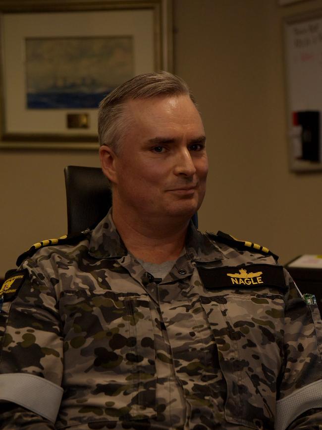 Commander Tony Nagle inside his day quarters onboard the HMAS Perth. Picture: (A)manda Parkinson