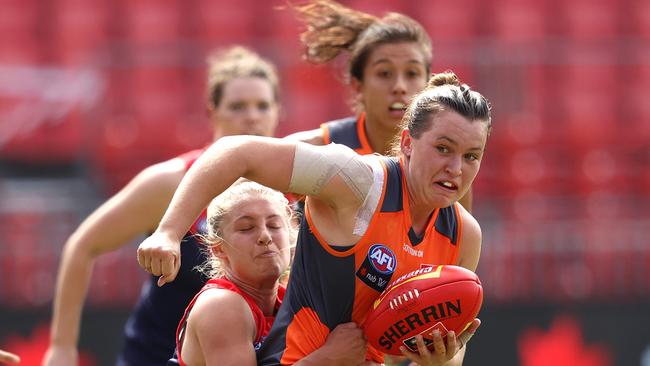 Alyce Parker under pressure during the AFLW semi final between the GWS Giants and Melbourne Demons.