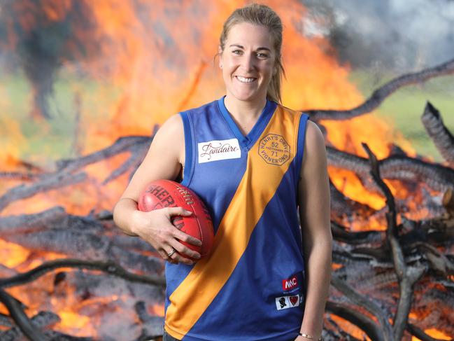 5.6.2019.Casey McElroy, 27, on the family farm at Marcollat with her dad Bradley,52 and grandfather Jeffrey,81.Casey  played in the men's reserves footy team for Padthaway last month and the club has been fined $1000. PIC TAIT SCHMAAL.