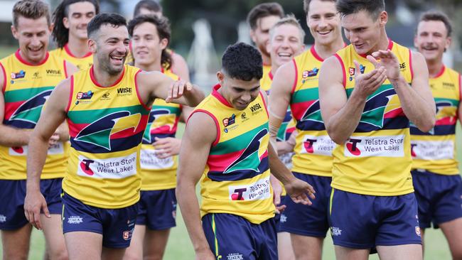 Tyson Stengle is congratulated by teammates after his four-goal haul. Picture: SANFL Image/David Mariuz