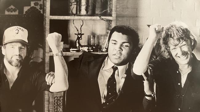 Copping (left) with Muhammad Ali and David Bilcock on the set of a 1977 TV ad for Soothers. Picture courtesy of Martin Copping