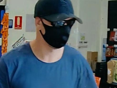 Police are requesting anyone with information regarding this man who robbed the store to please contact them. Picture: NSW Police/Supplied