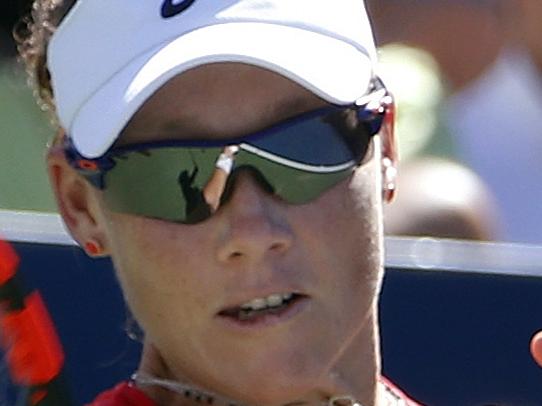 Samantha Stosur, of Australia, returns a shot against Sara Errani, of Italy, during the third round of the U.S. Open tennis tournament, Saturday, Sept. 5, 2015, in New York. (AP Photo/Jason DeCrow)