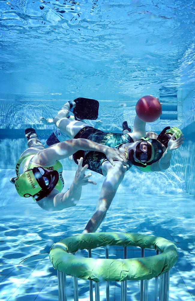 DAILY TELEGRAPH 11TH SEPTEMBER 2023 Pictured with the ball at Leichhardt Park Aquatic Centre is Ben Maslen and members of the UNSW Whales underwater rugby team. Picture: Richard Dobson