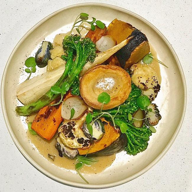 A vegetarian roast of pumpkin, parsnip, broccolini, carrot, charred onion, red cabbage, cauliflower, Yorkshire pudding with a porcini jus from The Fernery in Mosman.