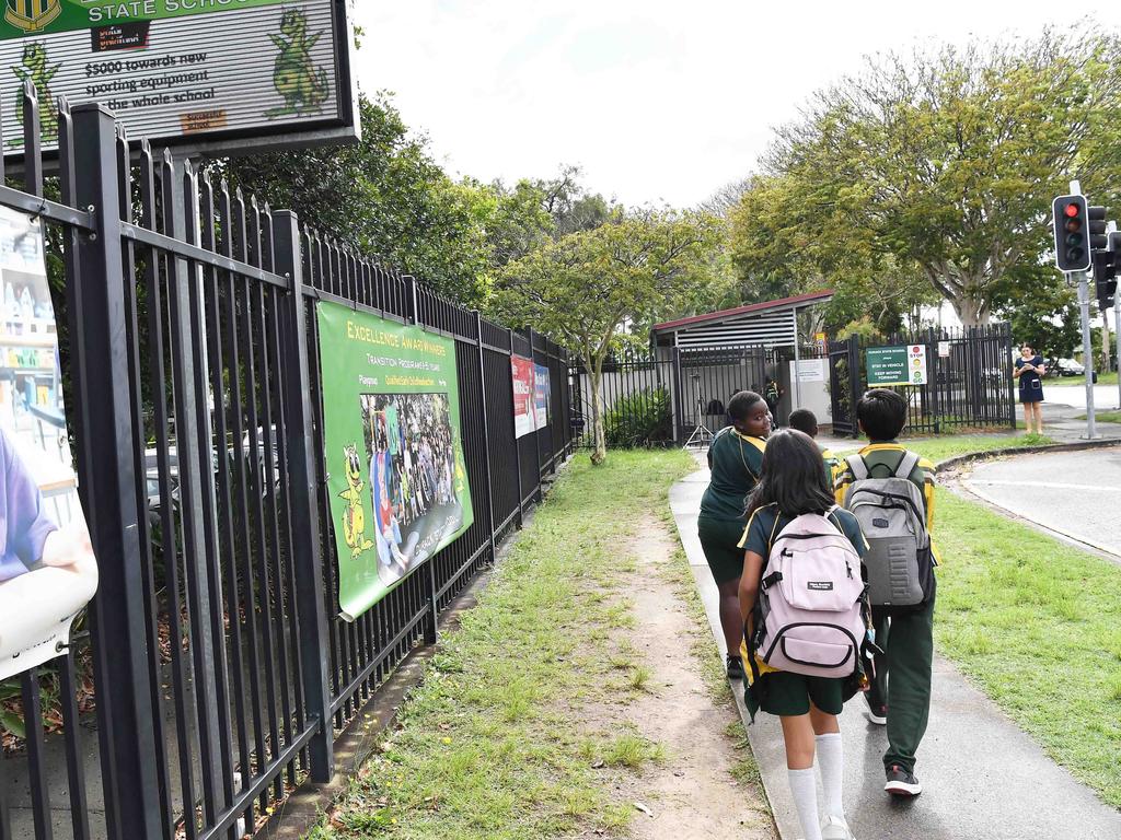 School kids return to the scene of the incident. Picture: Patrick Woods