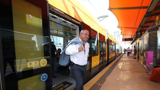 Mayor Tom Tate arrives by GLink at Broadbeach to the press conference announcing extra funding by the Federal Government for Stage three of the Light Rail. Picture Glenn Hampson