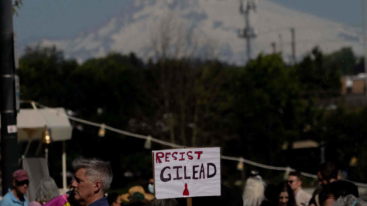 Mount Hood is seen in the background as a sign reads "Resist Gilead," a reference to The Handmaid's Tale, during a protest by abortion rights activists after the US Supreme Court struck down Roe Vs. Wade. Picture: John Rudoff/AFP