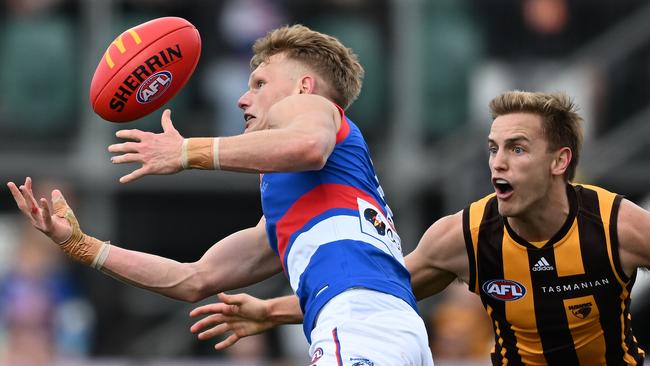 Adam Treloar in action against the Hawks in Round 23. Picture: Getty Images