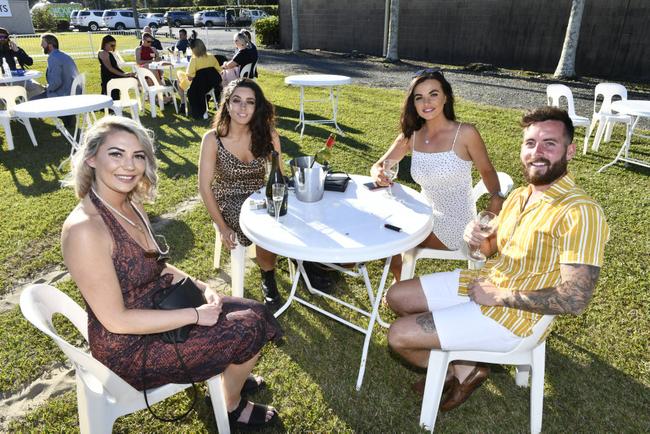 Jessica Rayner, Vai Millmore, Charlie Jones and Kaine McKenna show some style on Coffs Cup day. Picture: Adam Hourigan