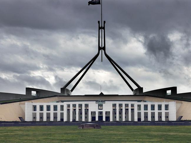 CANBERRA, AUSTRALIA NewsWire Photos - SEPTEMBER 20, 2021: COVID-19 and bad weather has kept most Canberrans inside as the ACT records 7 new cases. Storm clouds gather over Parliament House in Canberra.Picture: Newswire/Gary Ramage