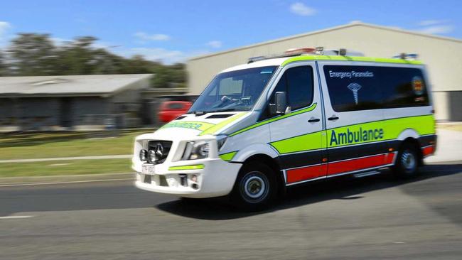 Queensland Ambulance Service Paramedics are on the scene of a motorbike crash. Picture: David Nielsen