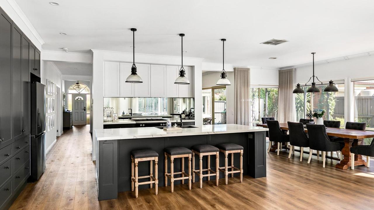 The open-plan kitchen and dining space flows from the front door.