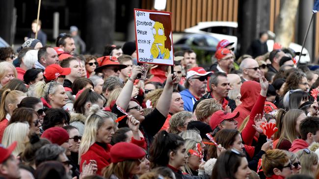 Protesters hold placards during a SA public school teacher's strike outside of SA Parliament House in July 2019. Pictures: AAP/Sam Wundke