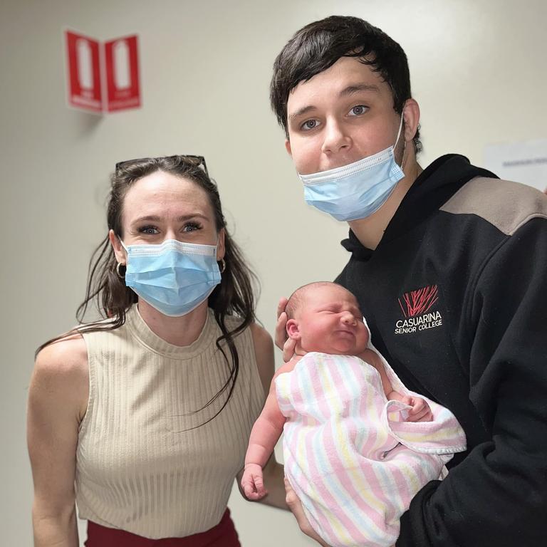 18-year-old Kingsley 'Junior' Alley holding his newborn daughter Eleanor, with stepmum Kylie Simmonds. Picture: Supplied.