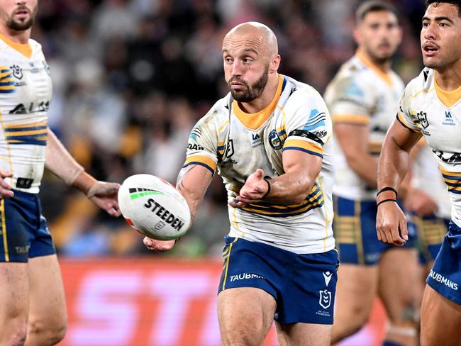 BRISBANE, AUSTRALIA - MAY 07: Josh Hodgson of the Eels passes the ball during the round 10 NRL match between Gold Coast Titans and Parramatta Eels at Suncorp Stadium on May 07, 2023 in Brisbane, Australia. (Photo by Bradley Kanaris/Getty Images)