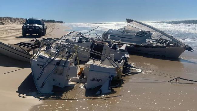 The wreckage of Brian Mateer's yacht, which washed ashore at Fraser Island in July 2022, after he and Alan “Scotty” Fitzgerald had to be rescued off the coast of the island.