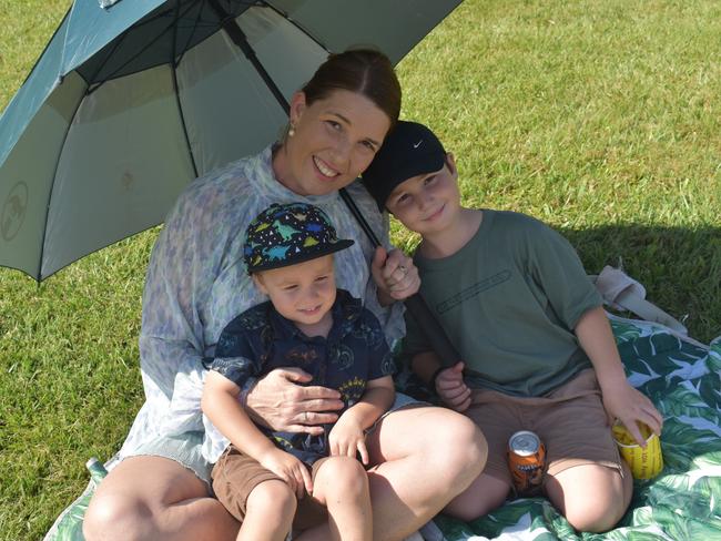 Mary Wilson with Isaac and Levi Dalton at the Yeppoon race day at Keppel Park racecourse on April 26, 2025.