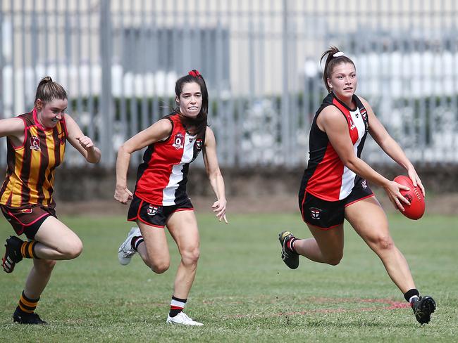 Saints' Kate Fowles and Poppy Boltz find space in the AFL Cairns women's match between the Cairns Saints and the Manunda Hawks, held at the Buchan Street field, Portsmith. Picture: Brendan Radke