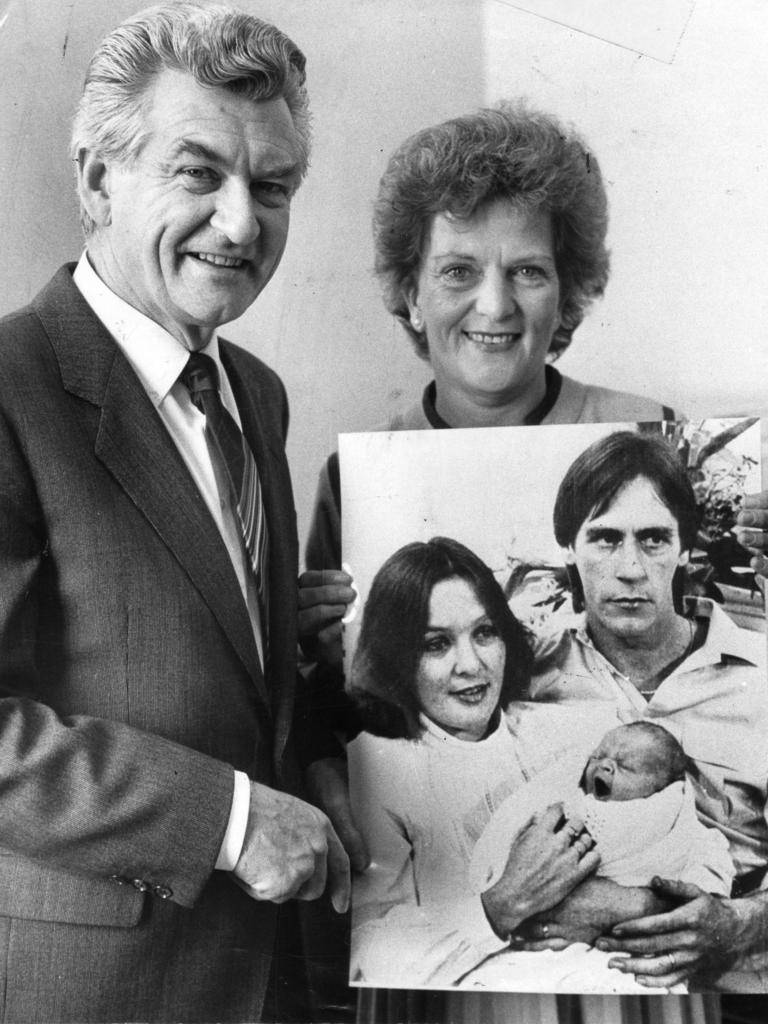 Proud new grandparents Bob and Hazel Hawke with a photograph of their new grandson in the arms of his mother Rosslyn and father Matt Dillon, at Parliament House, Adelaide in 1983.