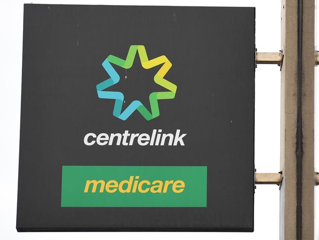 Generic image of Centrelink signage at the Prahran office in Melbourne, Tuesday, March 24, 2020. Centrelink offices around Australia have been inundated with people attempting to register for the Jobseeker allowance in the wake of business closures due to the COVID-19 pandemic. (AAP Image/James Ross) NO ARCHIVING