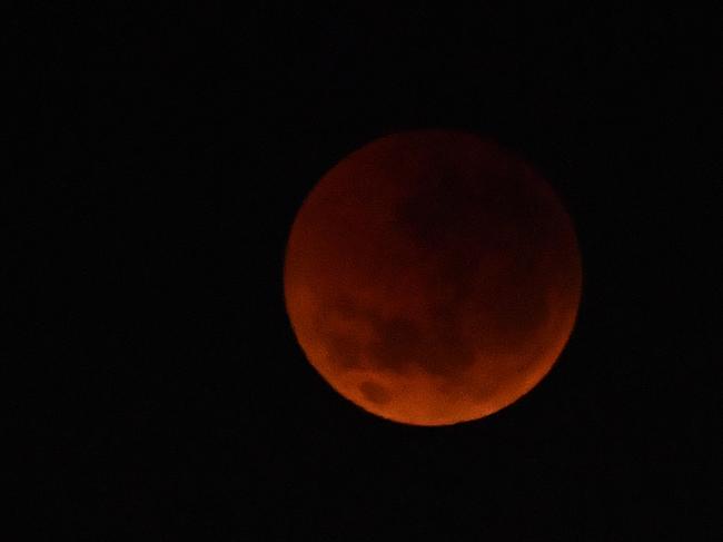 The moon is seen during a lunar eclipse in Sydney. Picture: AAP