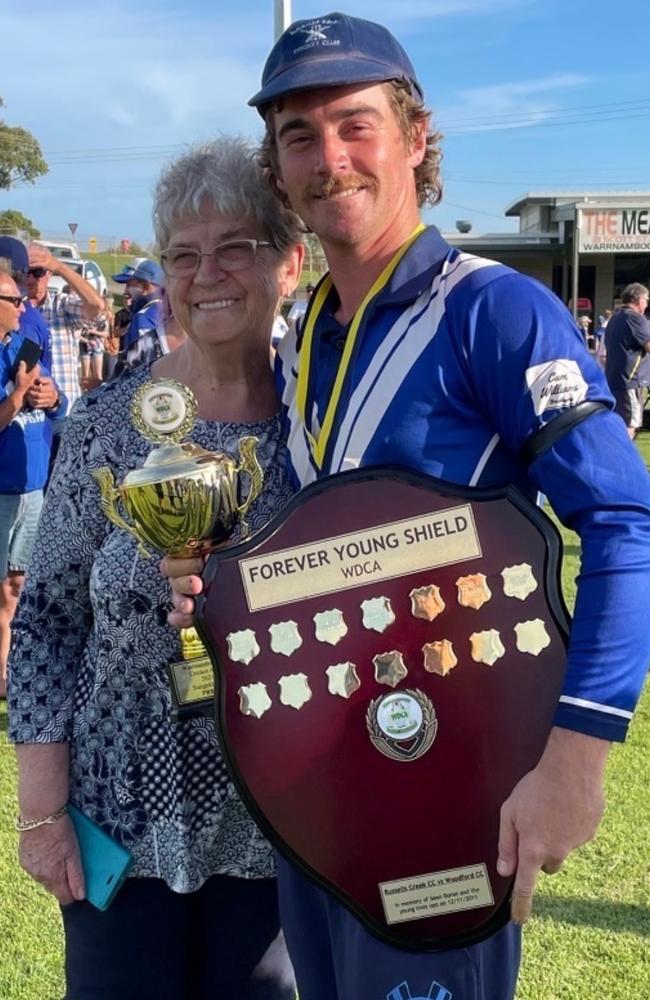 Cameron Williams, pictured with grandmother Rosalie, has played in four premierships for Russells Creek since crossing from Nestles.